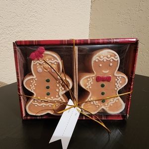 New in box. Gingerbread man and woman salt and pepper shakers.